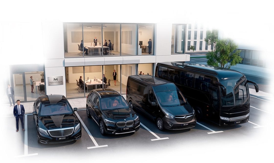 Ejecutivos de empresa revisando estadísticas en la app de taxis corporativos Moobiz